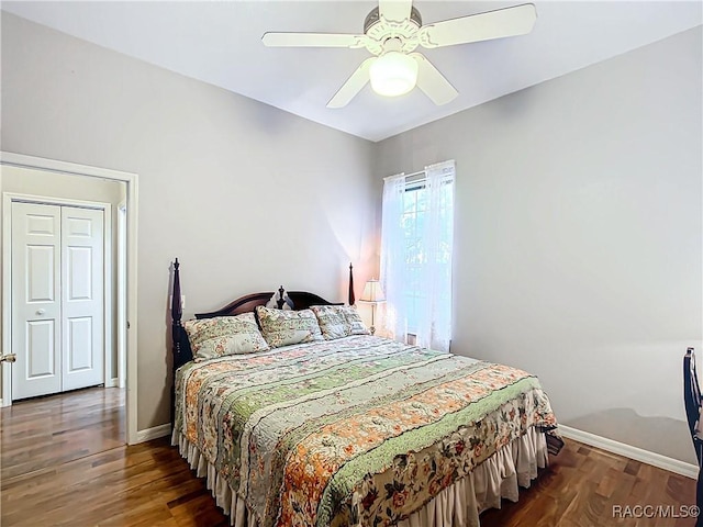 bedroom featuring a closet, ceiling fan, and dark hardwood / wood-style flooring