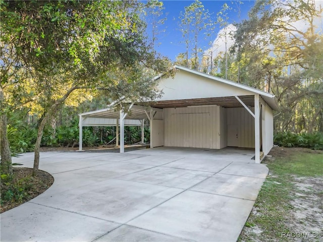 view of side of property with a carport