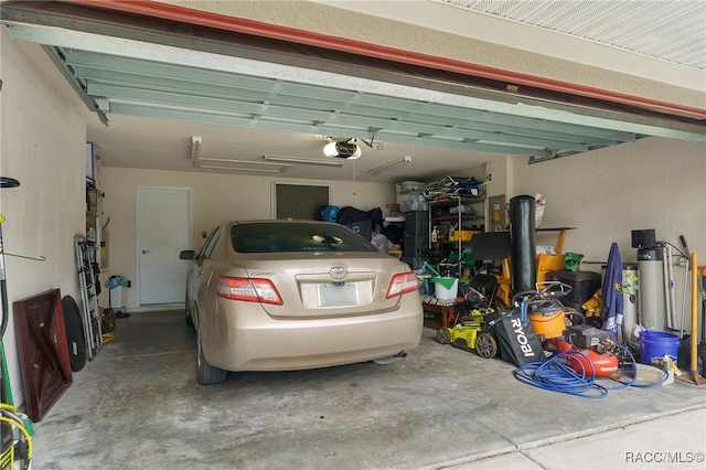 garage featuring a garage door opener