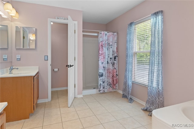 bathroom featuring tile patterned floors, curtained shower, and vanity