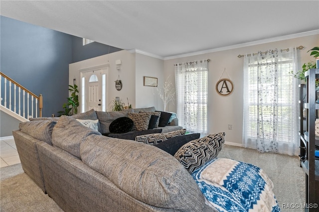 carpeted living room with ornamental molding