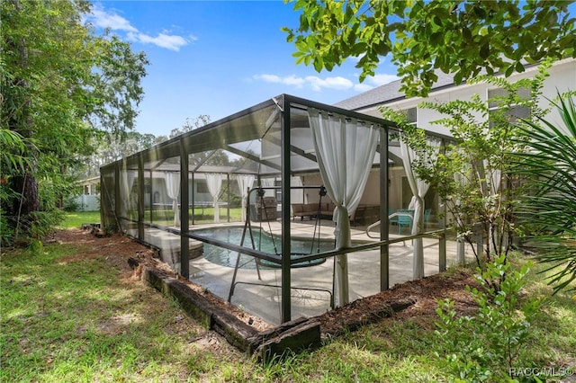 exterior space with a patio and a lanai