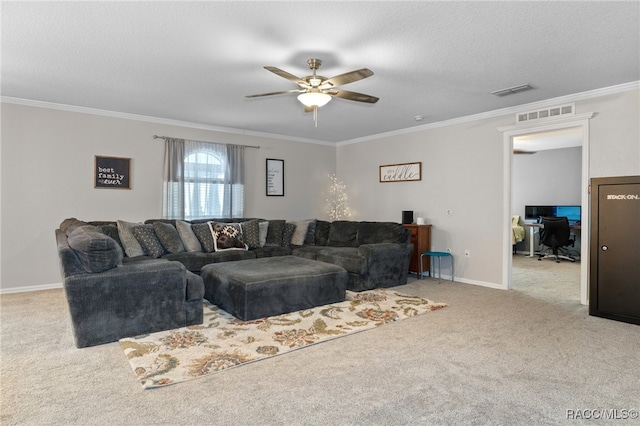 carpeted living room with a textured ceiling, ceiling fan, and ornamental molding