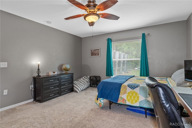 bedroom featuring ceiling fan and light colored carpet