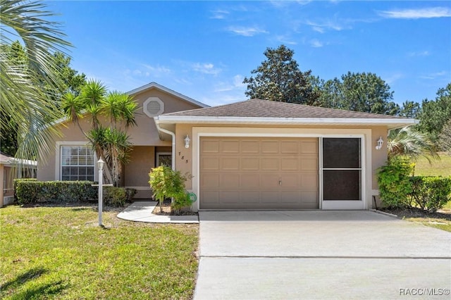 view of front of house featuring a garage, stucco siding, driveway, and a front yard
