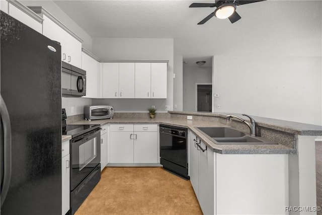 kitchen featuring a sink, a ceiling fan, a peninsula, a toaster, and black appliances