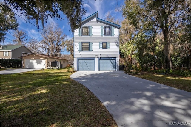 view of front of house featuring a garage, central AC, and a front yard