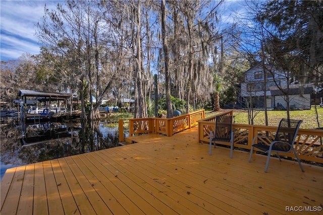 wooden deck with a water view