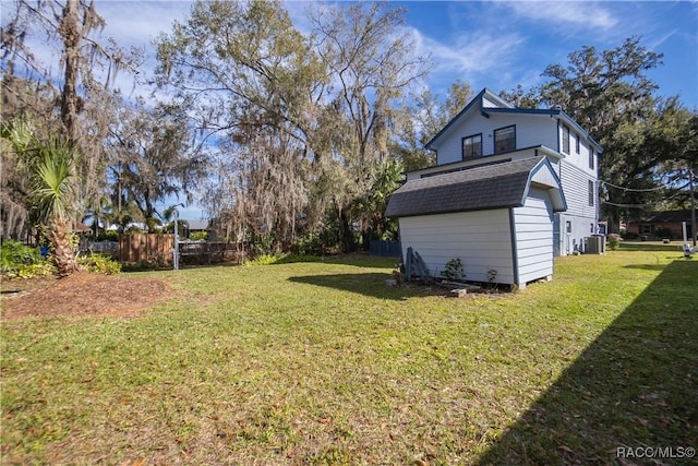 view of yard featuring central AC