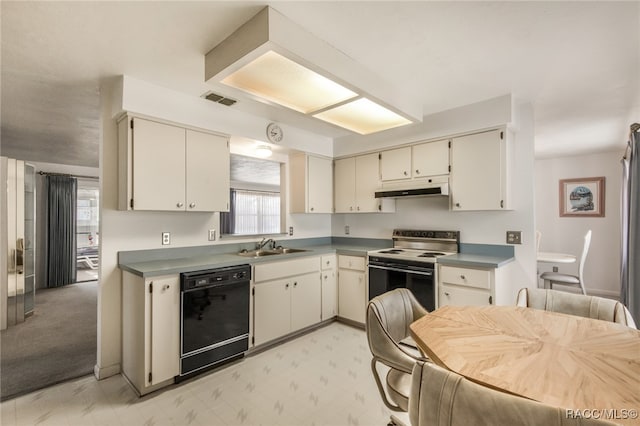 kitchen with dishwasher, stainless steel range with electric cooktop, light carpet, cream cabinets, and sink