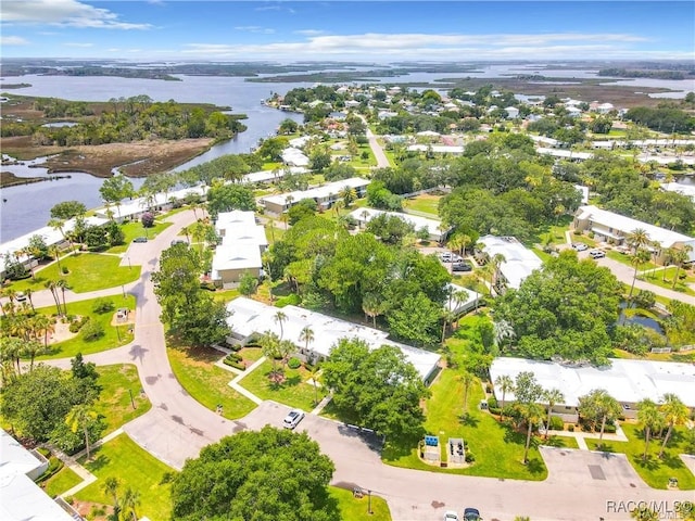 drone / aerial view with a water view