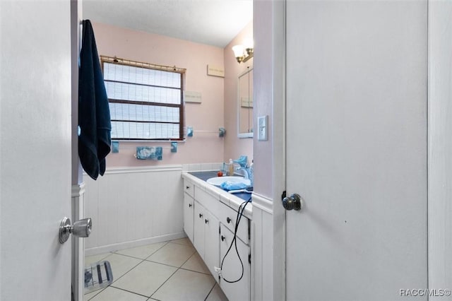 bathroom with vanity and tile patterned floors