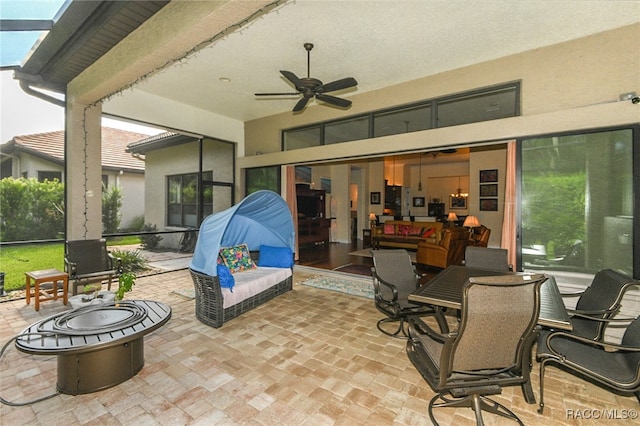 view of patio with ceiling fan