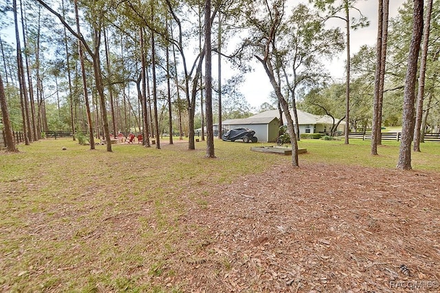 view of yard with fence