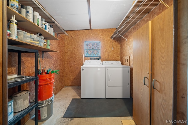 washroom with independent washer and dryer