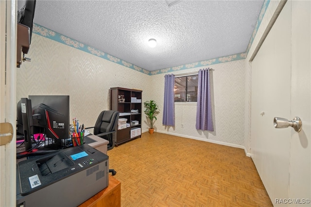 home office with parquet floors and a textured ceiling