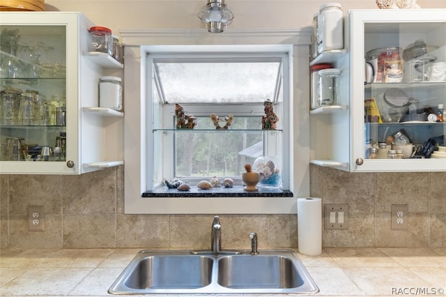 kitchen with backsplash and sink