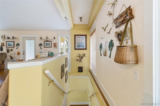 corridor featuring beam ceiling