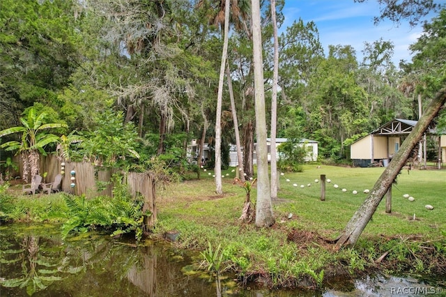 view of yard with a water view