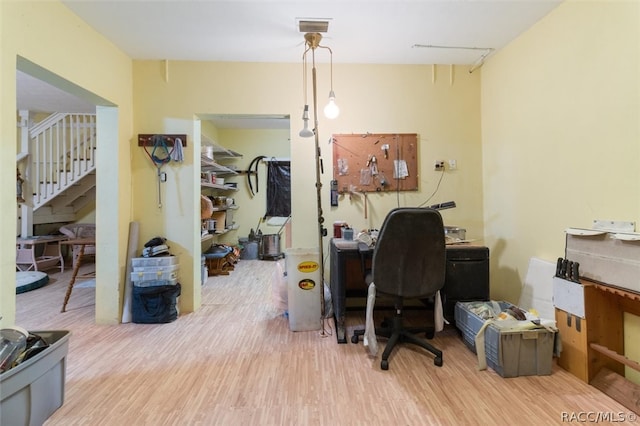 office space with light wood-type flooring