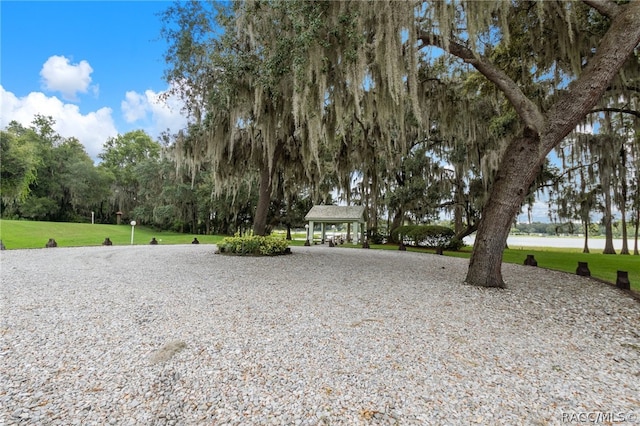 view of home's community featuring a yard