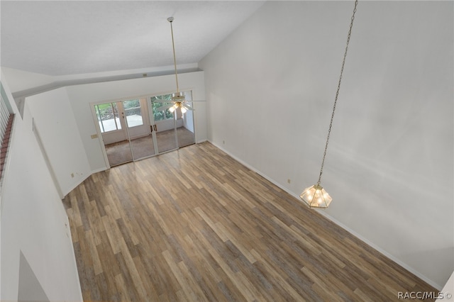 unfurnished dining area featuring ceiling fan and hardwood / wood-style floors