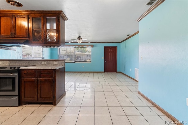 kitchen featuring crown molding, stainless steel range with electric cooktop, light tile patterned floors, and ceiling fan