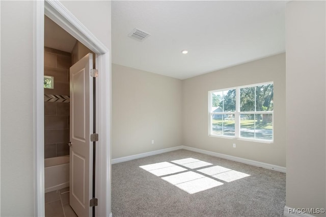 view of carpeted spare room