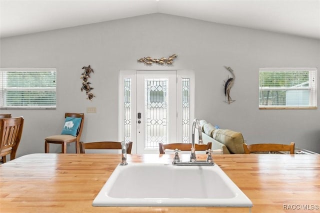 kitchen with vaulted ceiling and sink