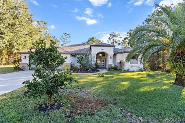 view of front facade with a front yard