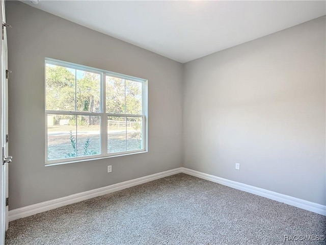 view of carpeted spare room