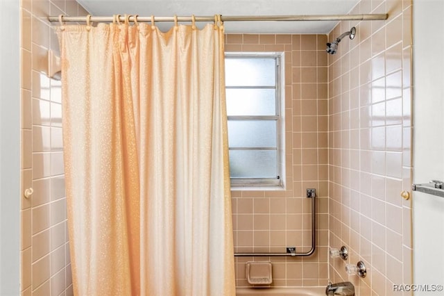 bathroom featuring shower / tub combo