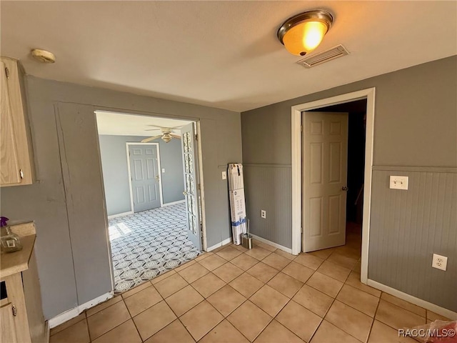 spare room with ceiling fan