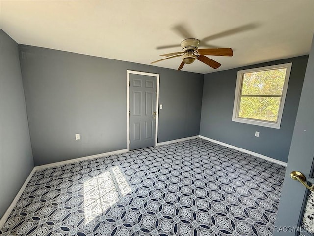 unfurnished room featuring ceiling fan