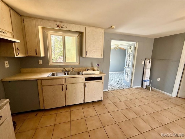 kitchen with sink, light brown cabinets, and ceiling fan