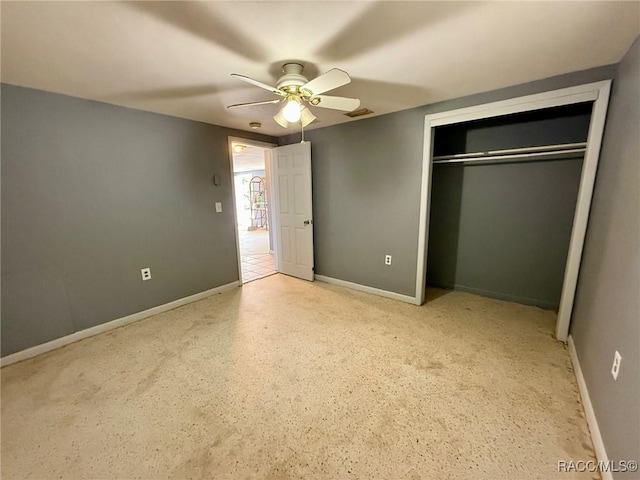 unfurnished bedroom featuring a closet and ceiling fan