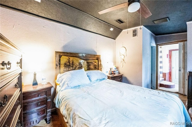 bedroom featuring vaulted ceiling and ceiling fan