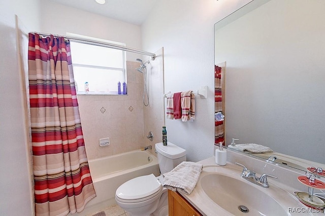 bathroom with shower / tub combo, vanity, and toilet