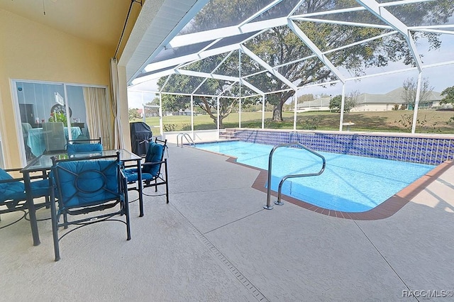 pool featuring a lanai and a patio