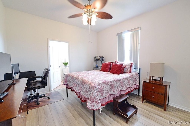 bedroom featuring light wood-style floors, baseboards, and a ceiling fan