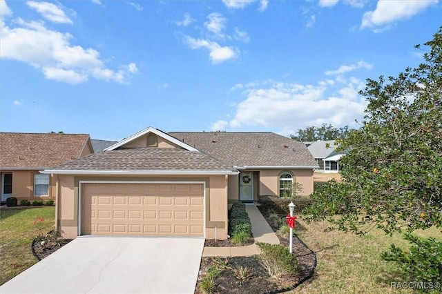 ranch-style home with a front yard and a garage