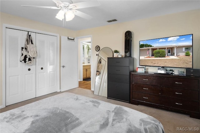 7 Colorado St, Beverly Hills, FL 34465 - bedroom with a ceiling fan, visible vents, light carpet, and a closet