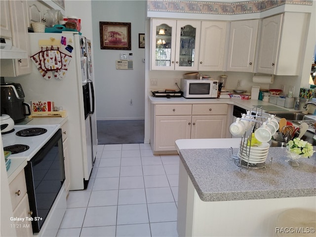 kitchen featuring white cabinetry, sink, ventilation hood, white appliances, and light tile patterned floors