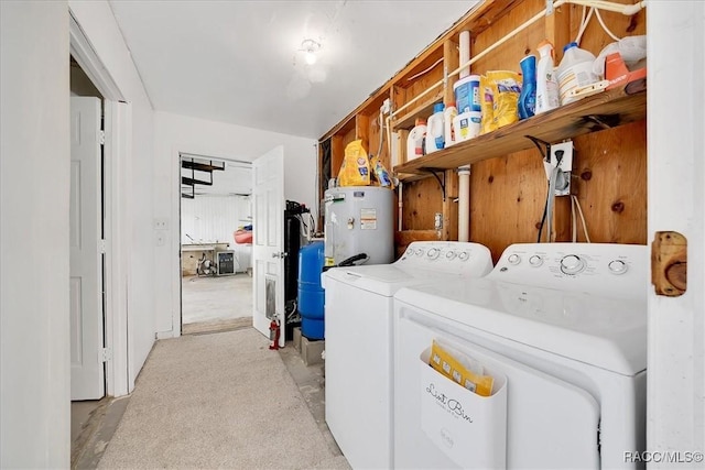 11615 N Caribee Pt, Inglis, FL 34449 - laundry room with washing machine and dryer and water heater