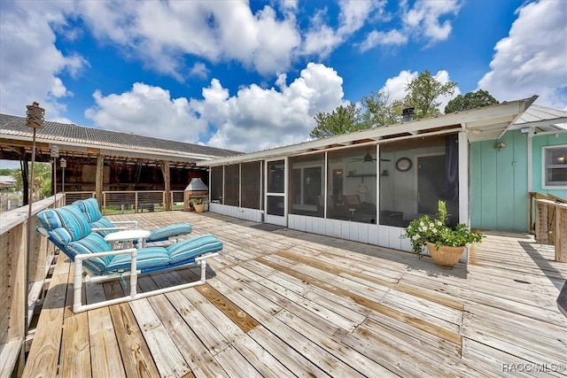 11615 N Caribee Pt, Inglis, FL 34449 - deck featuring a sunroom
