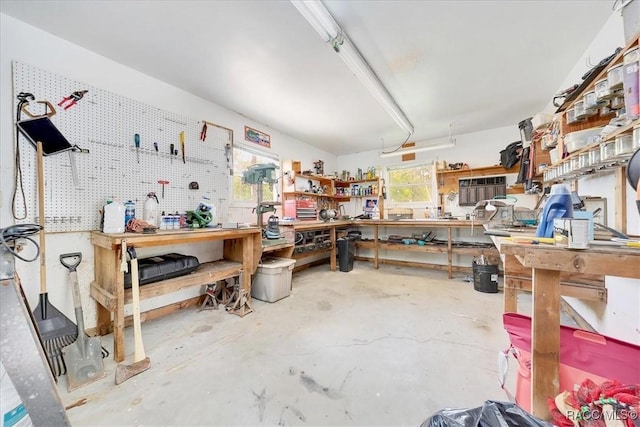 11615 N Caribee Pt, Inglis, FL 34449 - misc room with a workshop area and concrete floors