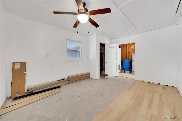 11615 N Caribee Pt, Inglis, FL 34449 - spare room featuring a ceiling fan and water heater