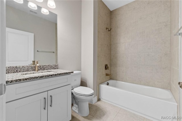 full bath featuring shower / washtub combination, visible vents, toilet, vanity, and tile patterned flooring