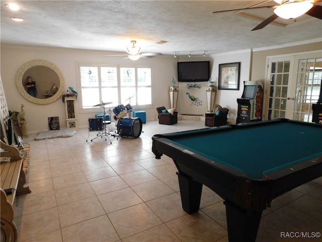 playroom featuring french doors, ornamental molding, ceiling fan, pool table, and light tile patterned flooring