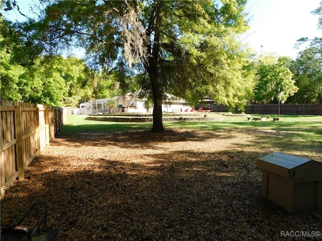 view of community with a lawn